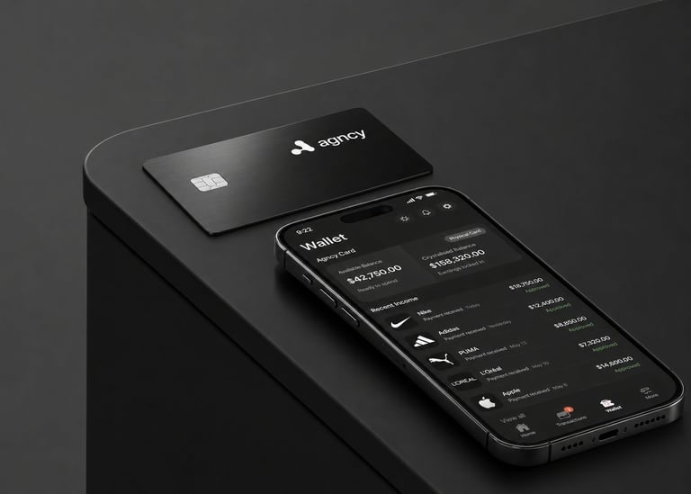 Black smartphone displaying a financial app interface next to a laptop on a dark surface